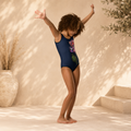 Wild One Kids Swimsuit front — hand-drawn Wild One illustration on stretch kids one-piece, Wild Lines Collection by Atme