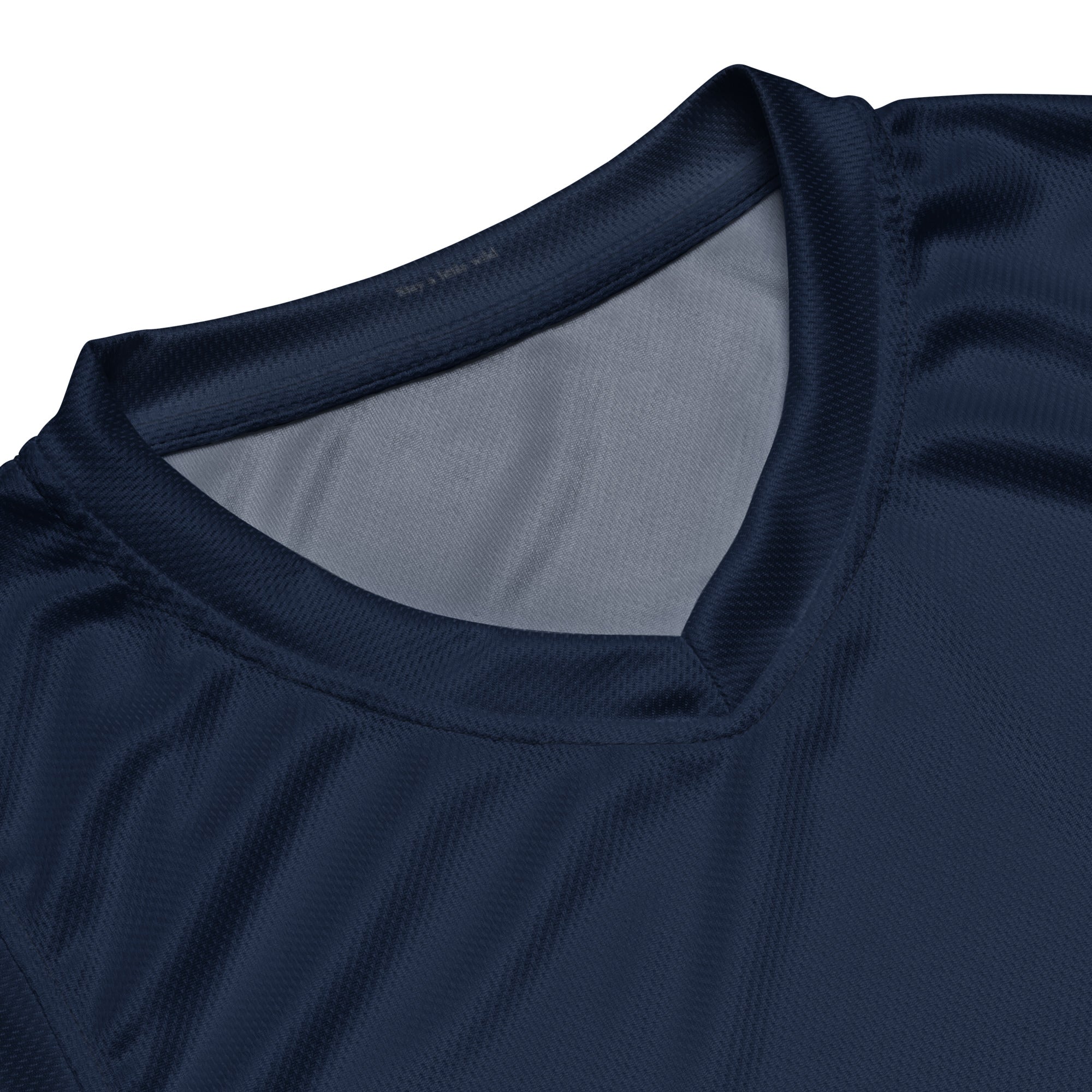 Wild One basketball jersey fabric detail — moisture-wicking recycled polyester close-up, Wild Lines Collection by Atme